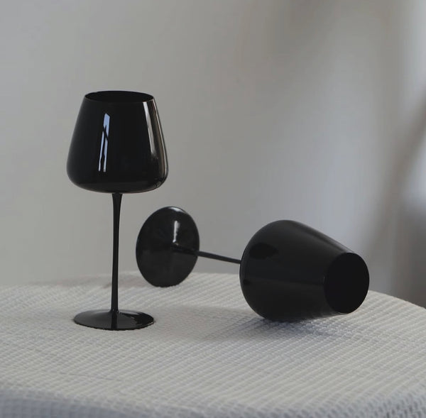 Pair of black long-stem wine goblets with sleek glass design for wine serving, dinner parties, celebrations, and everyday dining table settings