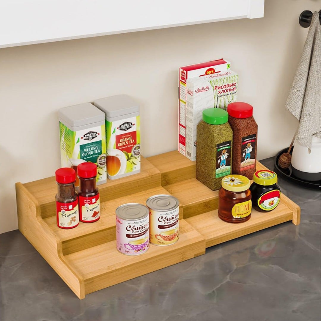 3-tier expandable bamboo spice storage rack for organising spice jars, seasonings, and kitchen containers on countertops, inside cabinets, and in pantry spaces.
