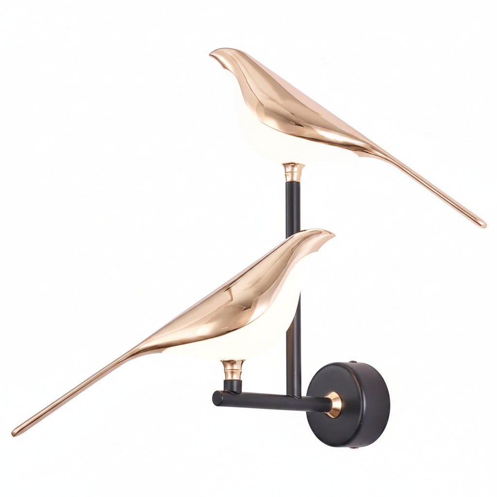 Gemelli Collections rose gold bird LED wall lamp featuring two illuminated birds on a matte black wall sconce for modern luxury interior décor.