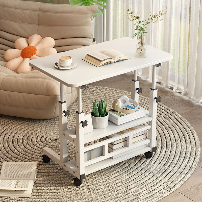 Adjustable movable laptop table with wheels, lower storage space and height adjustment from 69–90cm, available in black, white and brown.
