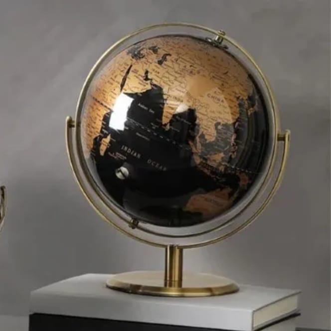 Gemelli Collections retro black and gold rotating world globe with gold metal stand for office and home décor.