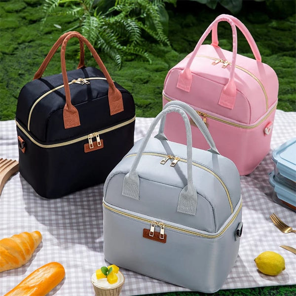 Double-layer insulated lunch bag with removable strap in Black and Grey for school, work, or travel.