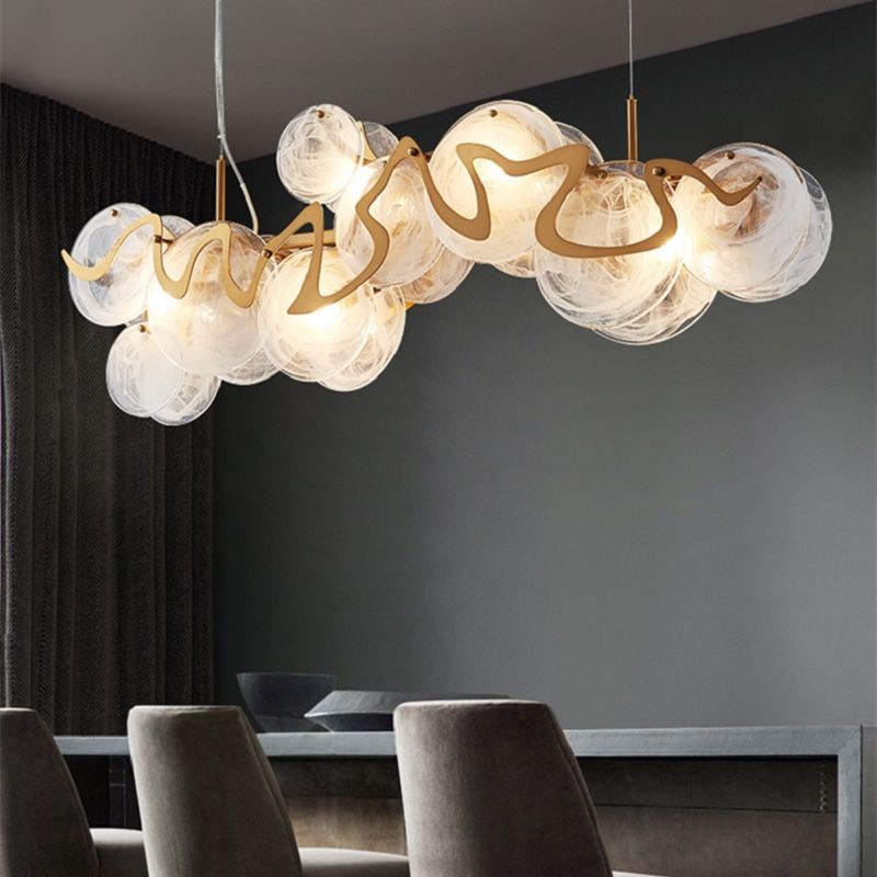 Linear cloud bubble chandelier with hand-blown white glass discs and brass wavy spine modern Murano style pendant lighting for dining table interiors