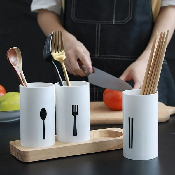 3-piece cutlery organiser with three utensil cylinders, drainage holes and an oak base for neatly storing spoons, forks and chopsticks