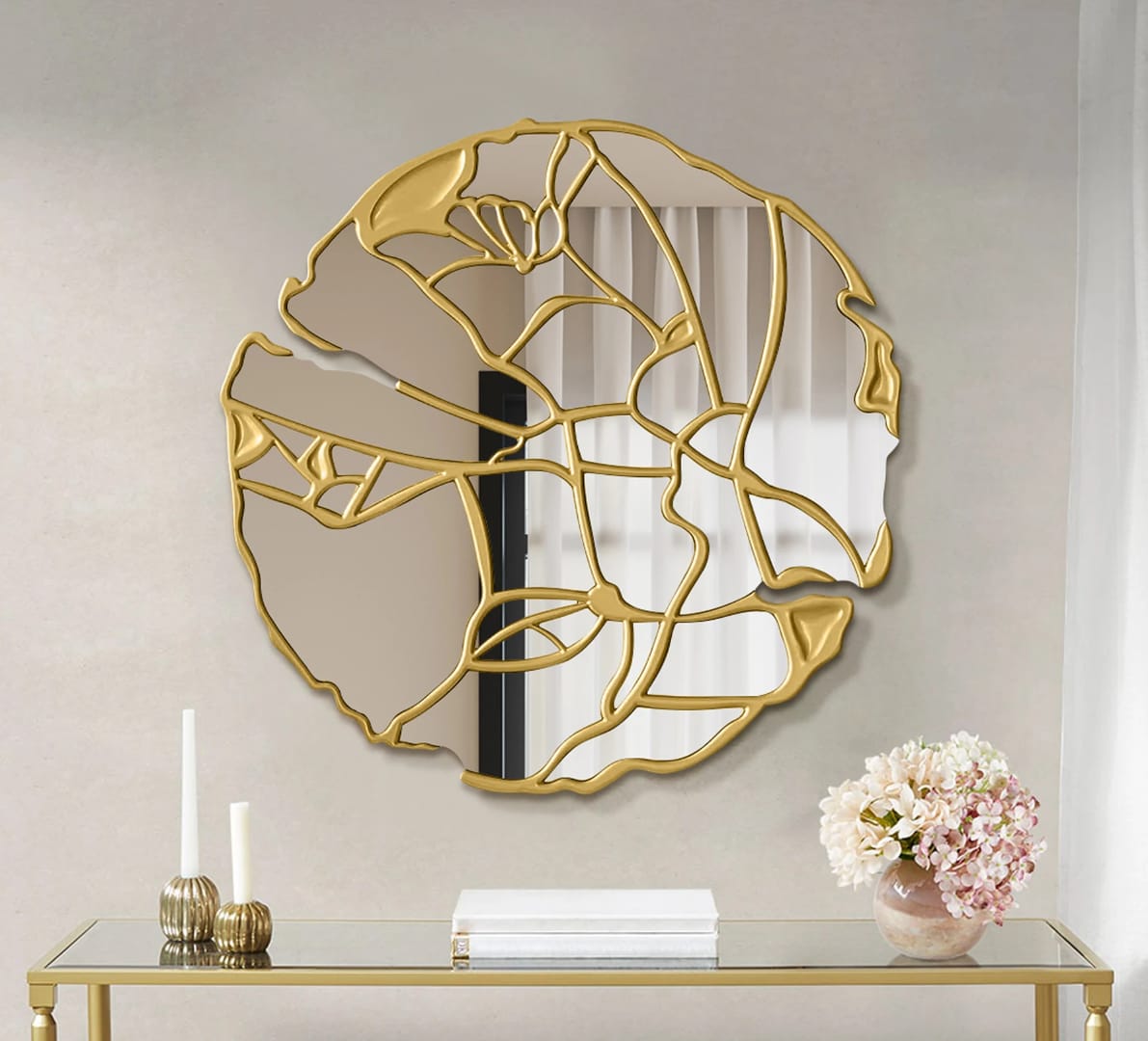 Gemelli Collections gold abstract wall mirror with organic sculptural frame and artistic cut-out design, ideal for luxury living room and console table décor.