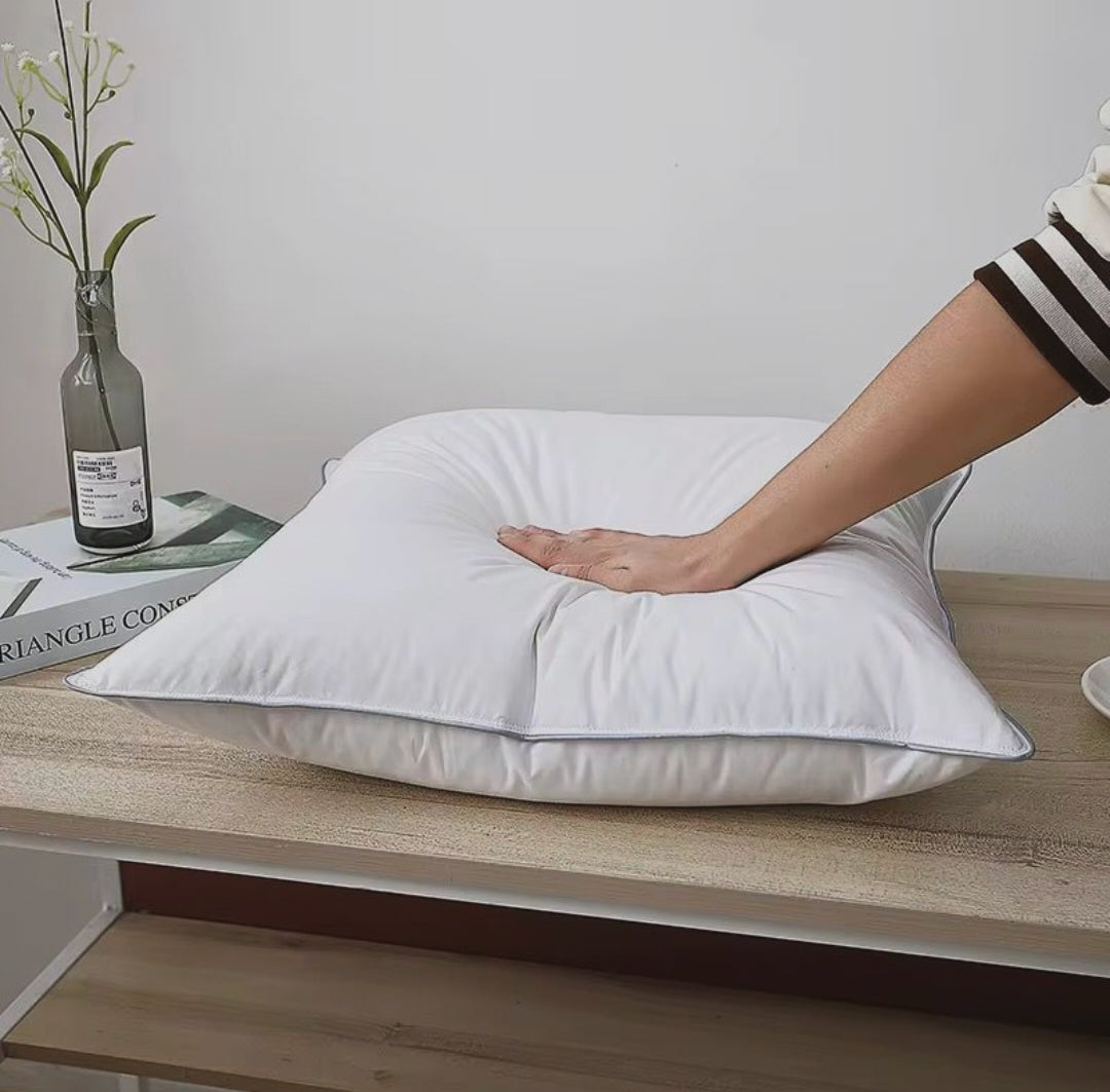 Ultra soft white goose cotton pillow set with breathable plush filling and supportive design for comfortable everyday sleep.
