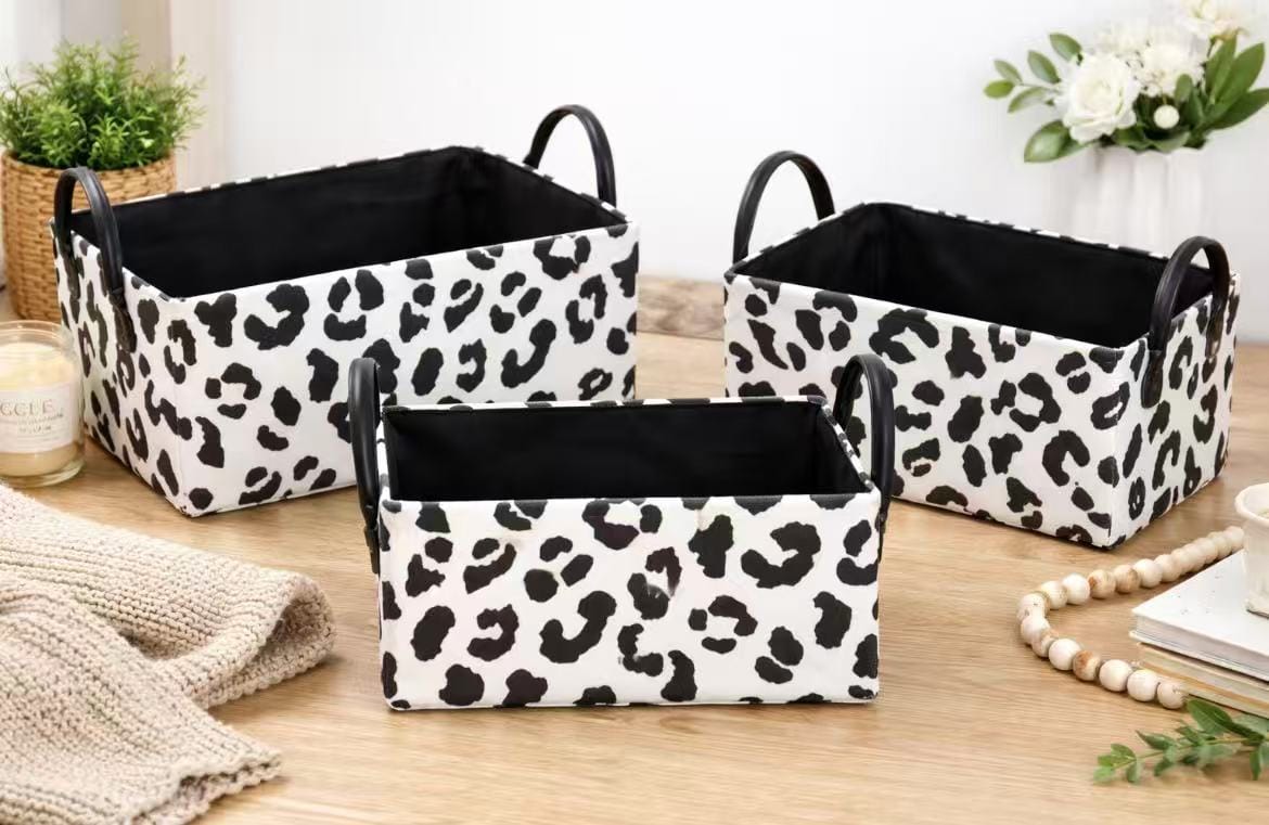 Set of 3 zebra and cow print storage baskets in different sizes with handles for home organization