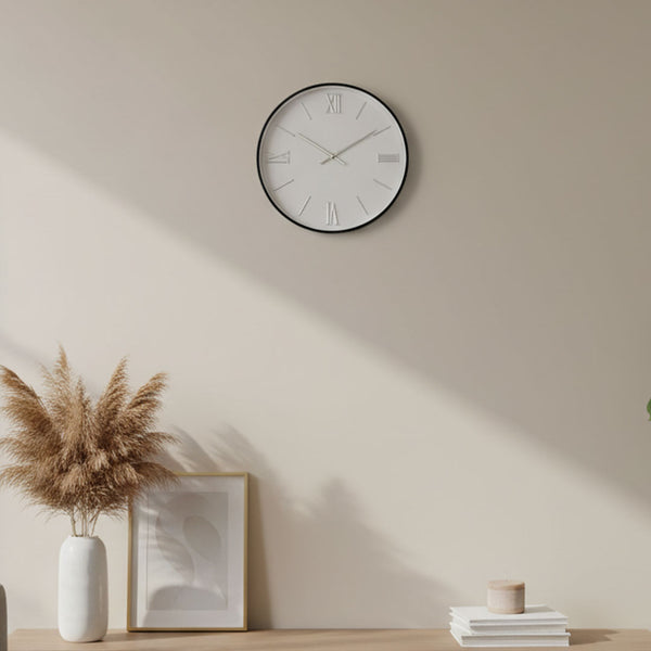 https://liveeasy.co.ke/wp-content/uploads/2025/03/roman-numeral-wall-clock-1.jpg