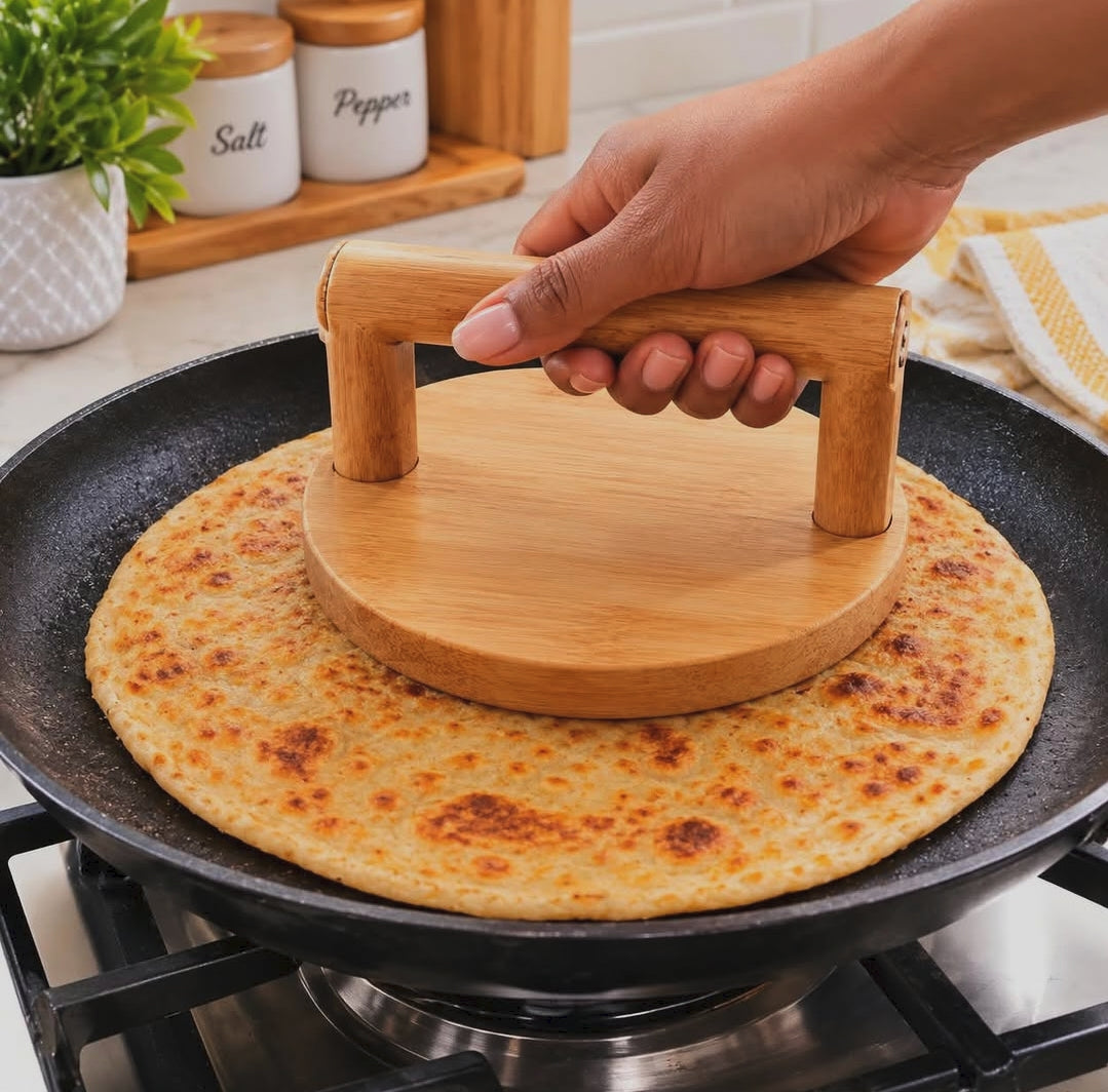 Round wooden chapati spinner with comfortable handle for turning chapatis during cooking, available in Nairobi, Kenya