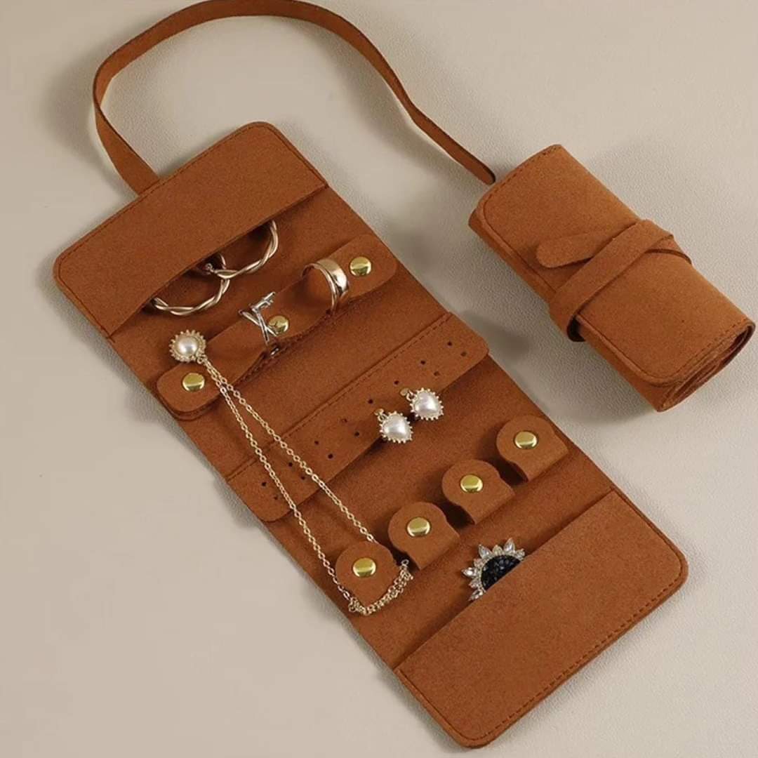 Travel jewellery organiser roll with compact portable design and multiple compartments for storing necklaces earrings rings bracelets and accessories tangle free travel jewellery storage pouch for handbags suitcases and everyday organisation available in Nairobi, Kenya