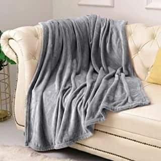 Super soft coral fleece throw blanket suitable for sofa and bed use