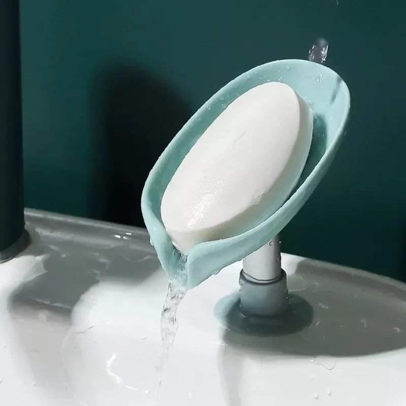 Leaf shaped self draining soap holder