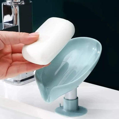 Leaf shaped self draining soap holder