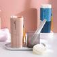 Portable toothbrush/toothpaste holder with a detachable cup