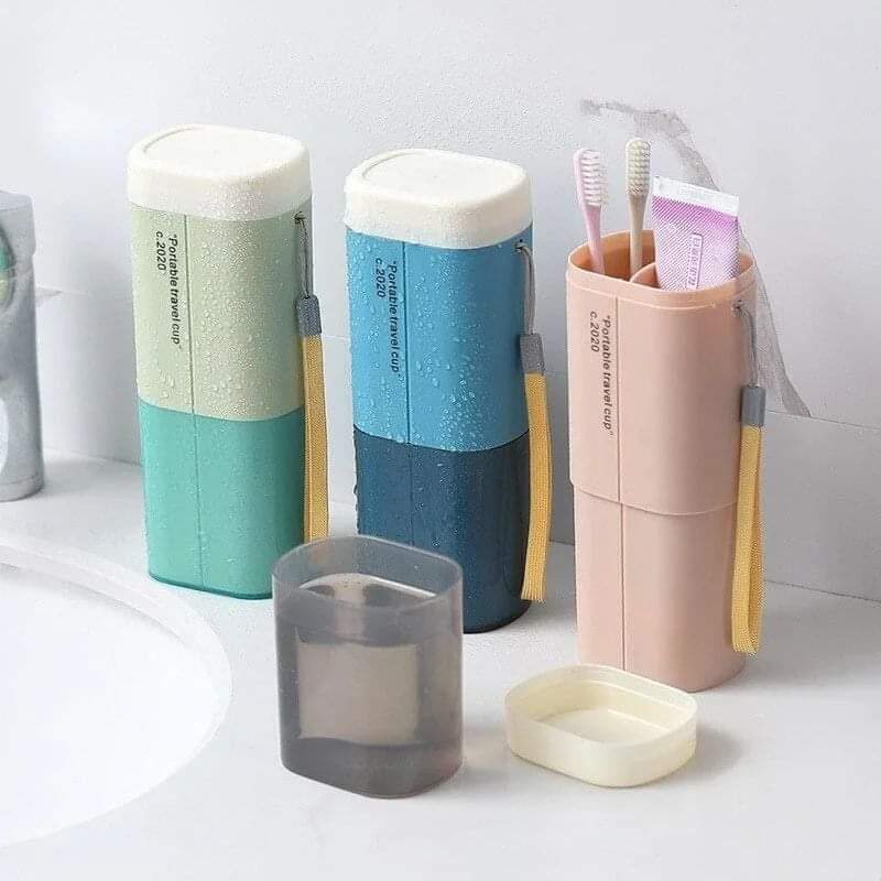 Portable toothbrush/toothpaste holder with a detachable cup