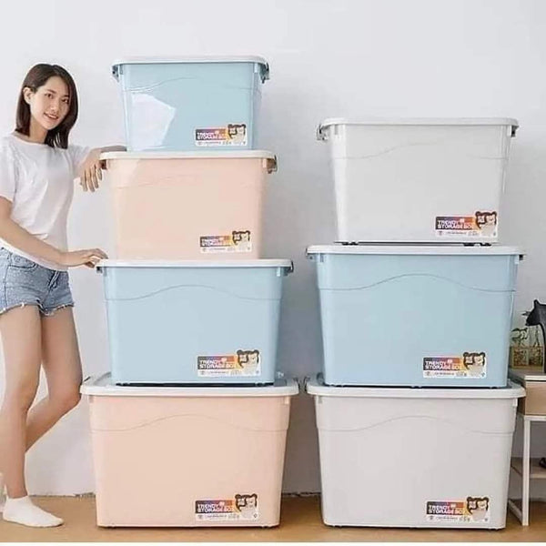 Plastic household storage buckets in multiple sizes used for organizing laundry, toys, and home items.