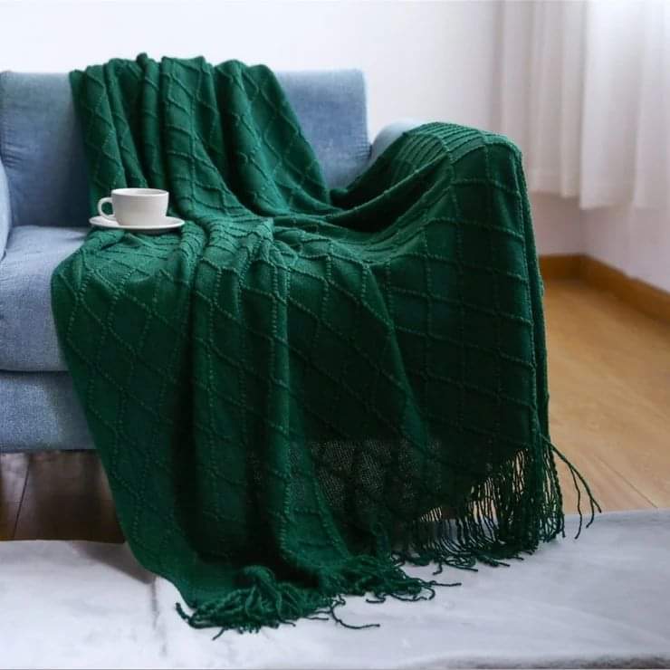 Knitted throw blankets with tassel