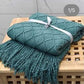Knitted throw blankets with tassel