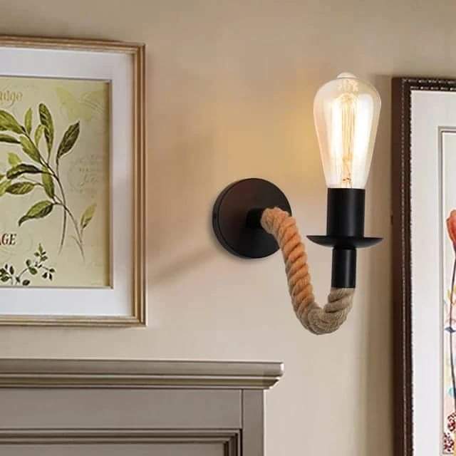 Antique rustic farmhouse wall light with rope design and single bulb fixture